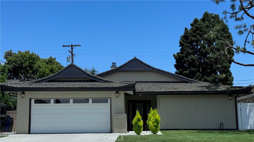 Beautifully upgraded single-story home featuring 4 spacious bedrooms and 2 fully remodeled bathrooms. This residence offers an open great room concept with a grand living and dining area separated by a stylish dual-sided fireplace. The upgraded kitchen boasts modern finishes, while newer flooring flows seamlessly throughout the home. Both bathrooms have been fully upgraded with contemporary touches. Enjoy a nice-sized backyard perfect for entertaining or relaxing, all set on a quiet, peaceful street.