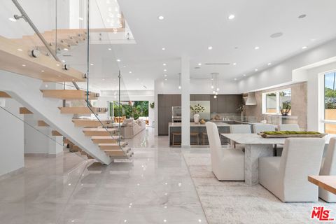 Photo of 11622 Charnock Road, Los Angeles, CA 90066 (MLS # 26831389)