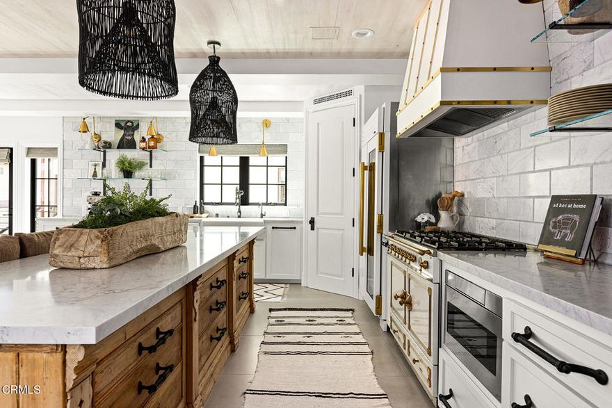 Great Value for a 2022 custom-built home at Pierpont Beach in Ventura!Now is your opportunity to celebrate life at the best beach in Ventura County.  Built in 2022 this like-new coastal home is move-in ready, with over $200,000 in recent upgrades. Just bring your sunscreen.Bespoke Furnishings Included.  Ideal for second home or relocation. Beautifully designed with a flexible floorplan perfect for a primary residence, tranquil beach retreat, or multi-generational nest, with plenty of space for entertaining guests. Bedrooms on all three floors with an elevator for easy access. The kitchen is eye candy, hosting top of the line appliances such as: La CornuFe, Fisher and Paykel, and True. Paired with a walk-in pantry, open shelving and plenty of drawer space, there is more than enough storage for all your culinary needs.The living spaces have upbeat finishes, loads of windows, wall mounted TV's and La Cantina style glass doors. Whole house sound system.Baths are well-equipped with curbless showers and two soaking tubs (one with a fireplace). Two laundry areas, with a third hookup available.You'll find interior and exterior custom automated blinds, several patios, and charming outdoor vignettes along with a low-maintenance private yard.Keyless entry gates, a motion activated security system and third floor ocean and mountain views round out just some of the many special details of this almost-new home.Additional Features:Fountains; Pre-wired for Driveway Gate; Wired for Electric Vehicle Charging Station; Full Size Wine Refrigerator; Laundry Connections on each floor; BBQ Grill. One block to ocean in charming Pierpont Lanes neighborhood. Easy access to L.A. or Santa Barbara Counties via 101.  Close to Ventura Harbor, and historic Downtown Ventura.