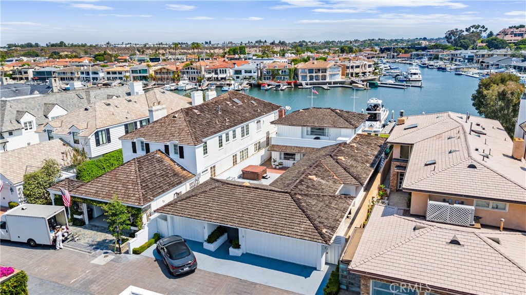 Waterfront Estate with Dock & Development Potential
A rare offering on prestigious, guard-gated Harbor Island, this waterfront home sits on a large lot with 50 feet of harbor frontage and includes a private dock for up to a 57’ yacht—an exceptional amenity for boating enthusiasts. Enjoy panoramic views of the harbor and direct access to the water.
Originally built in 1950 and retaining much of its original charm, the home features an open-concept remodeled kitchen, updated flooring, and a refreshed primary bath. The layout includes two bedrooms downstairs and a spacious upstairs master suite.
The rest of the home remains in its classic mid-century condition, offering the perfect canvas for customization, renovation, or complete redevelopment to create a one-of-a-kind coastal estate. This property represents a unique value proposition in one of the most ultra-exclusive areas of Newport Beach. The seller is open to joint venture opportunities, making this an ideal project for investors or end-users seeking custom harbor-front living.
This property is conveniently located near top-rated schools, shopping, and fine dining.