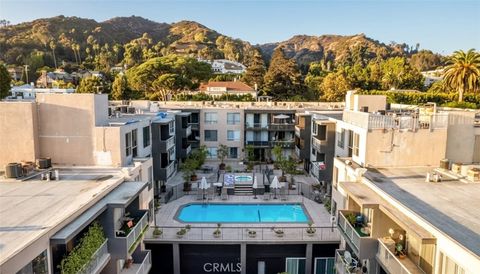 Photo of 1745 Camino Palmero St #537, Los Angeles, CA 90046 (MLS # PW26000942)