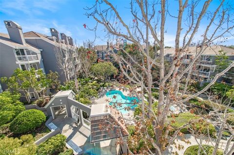 Photo of 20301 Bluffside Circle #D401, Huntington Beach, CA 92646 (MLS # TR26040644)