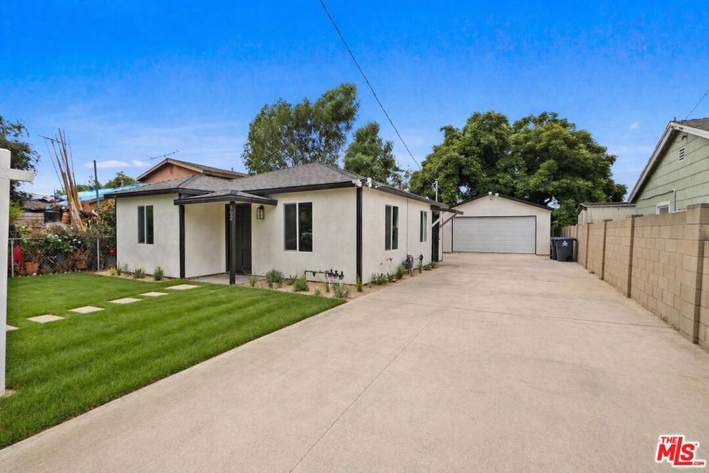 Photo of 802 N Gunther Street, Santa Ana, CA 92703 (MLS # 26827585)