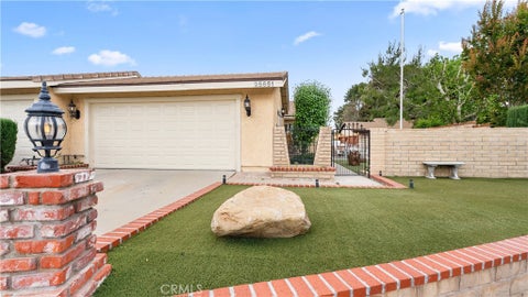 Photo of 25651 Ramada DR, Valencia, CA 91355 (MLS # SR26096640)