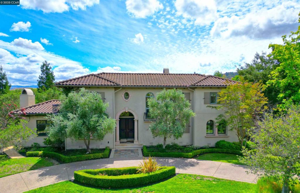 Classic Italian - Mediterranean custom built home in Ruby Hill Country Club. Same family owned and cared for this beautiful home for over 25 years. Wonderful floor plan. North facing. 4 bedrooms plus office. Office could easily be converted to a 5th bedroom. Double Viking ovens and microwave. Bosch dishwasher. Make this home your dream home! Expansive backyard with pool, spa, covered pavilion for outdoor dining with grill and refrigerator. Stunning outdoor fireplace. The large lawn and pavilion area are perfect for large family gatherings, baby showers, weddings and prom pics! Gated driveway in back. Circular driveway in front. A truly special place to call home!