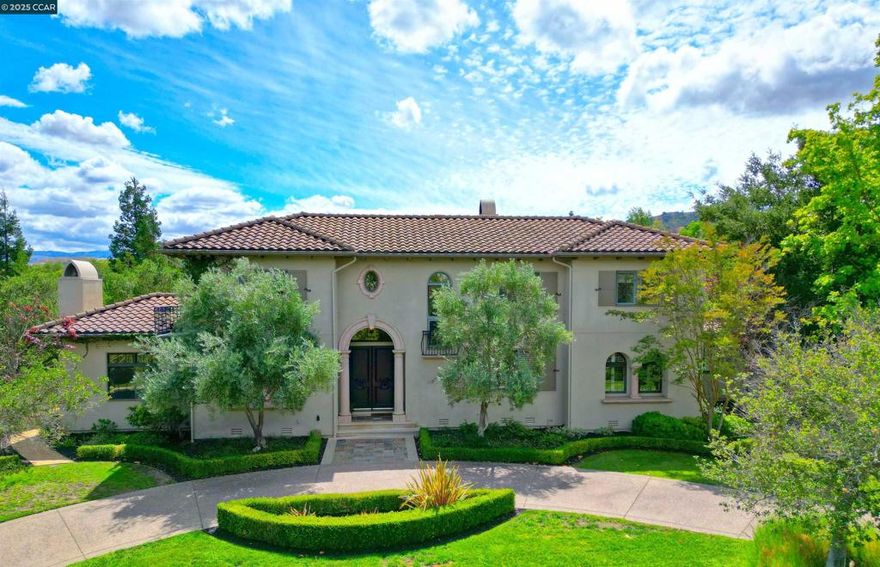 Custom built Mediterranean home on large corner lot in Ruby Hill Country Club.  Same family owned and cared for this beautiful home for over 25 years.  Wonderful floor plan. North facing.  4 bedrooms plus office.  Office could easily be converted to a 5th bedroom. Double Viking ovens and microwave.  Miele dishwasher. Make this home your dream home!  Expansive backyard with pool, spa, covered pavilion for outdoor dining with grill and refrigerator.  Stunning outdoor fireplace with adjacent space for large outdoor dining.  The spacious lawn and pavilion area are perfect for large family gatherings, baby showers, weddings and prom pics!  Gated driveway in back.  Circular driveway in front. A truly special place to call home!