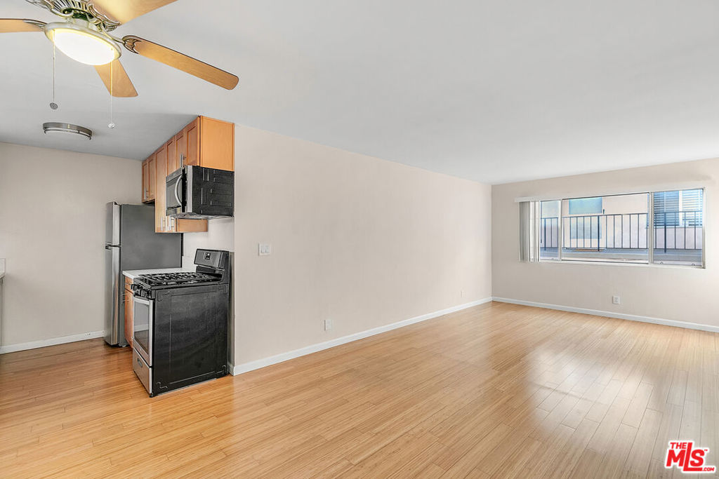 If you've been dreaming of a Santa Monica hideaway with room to actually move around, this one's for you. This spacious unit on beloved 6th Street has all the charm you've been cravingminus the cramped corners and permit parking headaches. Inside, you'll find gleaming wood floors, generous natural light, and a wide-open living and dining area that's ready for your oversized sectional, your yoga mat, or even that indoor bike you swore you'd ride daily. (No judgment.)The kitchen packs a punch with stainless steel appliances, including dishwasher! Whether you're meal-prepping for the week or just microwaving leftover pizza, it gets the job done with style. The dining space gives you actual room for a table, so you're not eating over the sink (unless that's your thing). The charm continues through the rest of the unit with extra storage in the hall and a lovely bathroom. In the spacious bedroom, mirrored closet doors help bounce the light around and make your morning routine feel just a little bit fancier. Parking? Included. Pets? Welcome. Beach? Just a hop, skip, and a sand-covered shoe away. This is your laid-back Westside lifestyle ready and waiting for you!