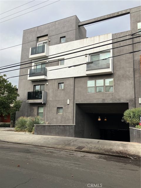 Photo of 11925 KLING ST #111, Valley Village, CA 91607 (MLS # SR26090576)