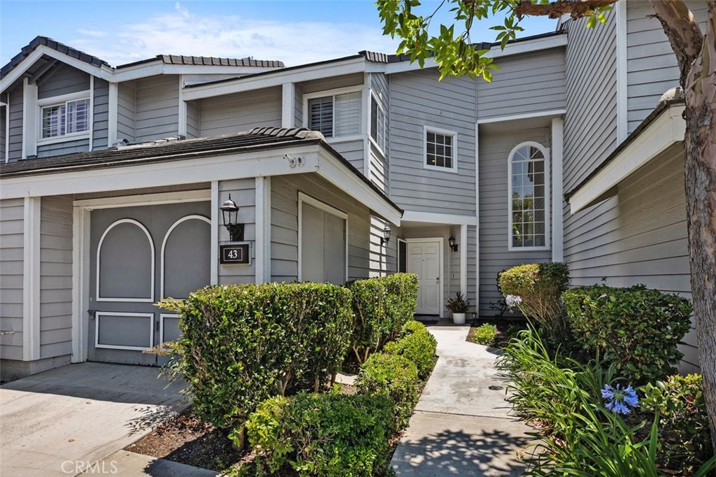 This lovely town home shows like a 'little house' with an attached garage and no one above or below. Luxury Vinyl Plank floors, new carpet and paint, as well as many wonderful windows and vaulted ceilings give it a fresh light, open and cheerful atmosphere. The living room has a recently added marble tile surround on the corner fireplace and opens to the outdoor space through a large patio door. The kitchen has been stylishly renovated with new cabinets, quartz counter tops, a large stainless steel sink with new pull down faucet and a new microwave oven. The adjacent roomy dining room opens to a spacious stone tile patio and a large garden area which are perfect for relaxing, entertaining and gardening. An attached garage with washer dryer hook-ups opens conveniently to the kitchen. Upstairs natural light flows into the primary bedroom which has a private balcony perfect for relaxing,while the additional bedroom has corner windows offering abundant light. Custom white shutters offer an attractive upscale touch in the living room, dining room and both bedrooms. This home is within walking distance of John Malcom Elementary School and Beacon Hill pools and tennis courts. Just minutes away are the Salt Creek Beach, Ritz Carlton and Monarch Beach Hotels, as well as the Ocean Ranch shopping center with its restaurants, shops, fitness club, coffee shop, Trader Joe's and movie theaters. The picturesque Dana Point Harbor, in the midst of a spectacular renovation, and the vibrant downtown areas of Laguna Beach, Dana Point and San Juan Capistrano lie very close to this desirable area of Laguna Niguel. Situated in the beautiful beach close rolling hills of South Orange County, Beacon Hill offers an opportunity to live as if "on vacation" every day!