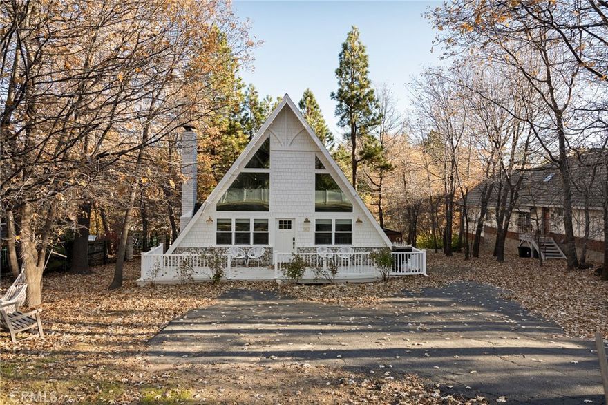 Here it sits, your quintessential "A-Frame" located in Lake Arrowhead with Lake Rights in a coveted neighborhood. built in 1964 this is the epitome of A-Frames, located in a cul-de-sac on a gradual downslope, near level lot, with lots of parking and close to the Tavern Bay Beach Club. With only one step up to the front door upon entering you'll be wowed by the soaring vaulted ceilings, captivating open space and flood of natural light. It almost feels effortless to glide through this space. On the main floor you'll find the living room, renovated kitchen, dining space, 2 bedrooms a main floor bath, and access to the back deck. Upstairs is a an open loft "primary suite" bedroom with full bath, secret nook, and the laundry/storage closet. The outside space is highly usable and you'll find little areas to sit and rest allowing you to take in the towering pine and oak trees. There is even a small shed out back that is currently bing used as an art space. Some of the renovations include, dual pain windows, front hardiebacker siding, light fixtures, paint and more. Home is equipped with central AC and comes furnished, minus sellers exclusions. This is a highly active STR, Don't let this one slip out of your hands.