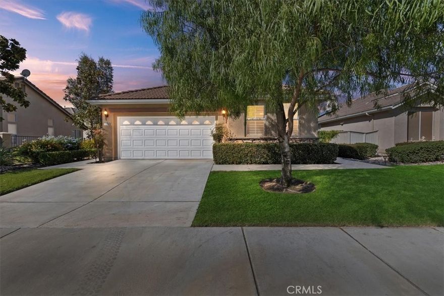 Located in the Oasis 55+ guard gated resort style community, this residence blends comfort, elegance, and lifestyle. Boasting 2,085 sq ft of living space on a 5,663 sq ft lot, this home offers 2 bedrooms, 2.5 baths, and an attached 2-car garage. 



Step inside to discover a spacious, light-filled layout with vaulted ceilings and an open concept living/dining area. A cozy fireplace adds warmth and charm to the great room. The kitchen is ideal for entertaining, with ample cabinetry and counter space (with the potential for modern upgrades).



The primary suite features a suite bath and generous closet space, while the second bedroom and bath provide comfortable accommodation for guests. Third room was used as an office and can be used as a bedroom.



Outside, the yard invites you to relax beneath a covered patio, with room for outdoor living and enjoying the sunshine in privacy. The location in the Oasis community affords access to numerous amenities: clubhouse, pool and spa. It is conveniently located near shopping, dining, medical services, and freeway access.



Don’t miss this opportunity in the heart of Menifee’s sought-after 55+ community.
