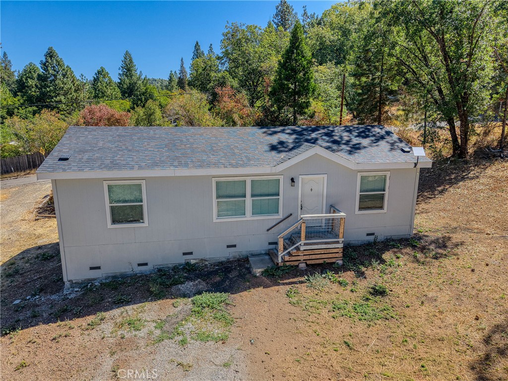 This charming newer manufactured home on a permanent foundation offers comfortable living on 1.38 acres in Kelseyville. The 3-bedroom, 2-bathroom house features 1,056 square feet of thoughtfully designed space with an open concept layout.
The home showcases modern vinyl plank flooring and includes a convenient closet for ample storage. The open floor plan creates a welcoming atmosphere perfect for daily living and entertaining guests.
Located on Saddle Road, this property sits on a generous lot that provides plenty of outdoor space for recreation, gardening, or simply enjoying the peaceful rural setting. The residential agricultural zoning offers flexibility for various uses while maintaining the area's quiet character.
Practical features include a private well on the property and a septic system, ensuring reliable utilities. Parking is easily accessible on the spacious grounds.
The location offers a nice balance of privacy and convenience. Lakeside recreational areas are nearby for outdoor activities, while Riviera Foods provides shopping options within a reasonable distance. The neighborhood maintains a relaxed country feel while still offering access to essential amenities.
This property presents an excellent opportunity in Lake County's scenic environment. The combination of modern updates, practical features, and room to grow makes it ideal for those wanting more space and freedom than traditional suburban living provides.
The home is move-in ready and represents solid value in today's market.