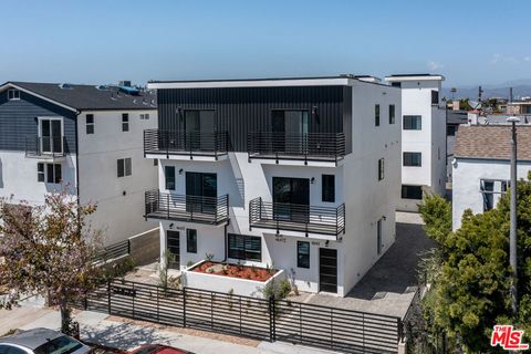 Photo of 4647 1/2 W 18th Street, Los Angeles, CA 90019 (MLS # 24416301)