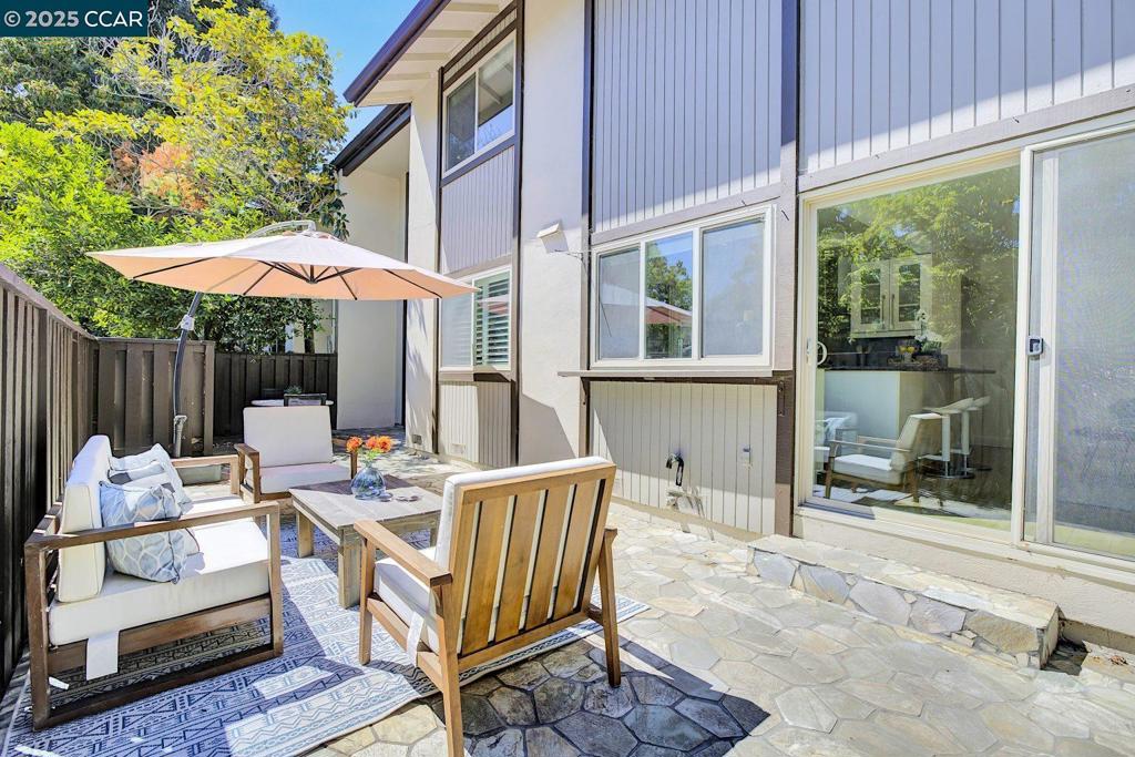 Welcome to this beautifully maintained 4-bedroom, 2.5-bathroom townhome nestled in the desirable Countrywood complex of Walnut Creek. Blending comfort, style, and convenience, this home features a light-filled living room with a cozy fireplace, fresh interior paint, and thoughtful updates throughout. The updated kitchen boasts sleek cabinetry, stainless steel appliances, and modern finishes. A convenient laundry room and extra storage are located downstairs. Upstairs, two bedrooms share a spacious hall bathroom. Step outside to a private patio—ideal for entertaining or enjoying a quiet moment. Enjoy the practicality of both an attached 2-car garage and ample guest parking, with RV storage available. The Countrywood community offers resort-style amenities, including a sparkling pool, clubhouse, lush greenbelts, and meticulously maintained common areas. Ideally located just minutes from Pleasant Hill BART, Hwy 680, the Iron Horse Trail, Heather Farm Park, and top-rated schools. Plus, you're just moments from shopping and dining at the nearby Countrywood Shopping Center.