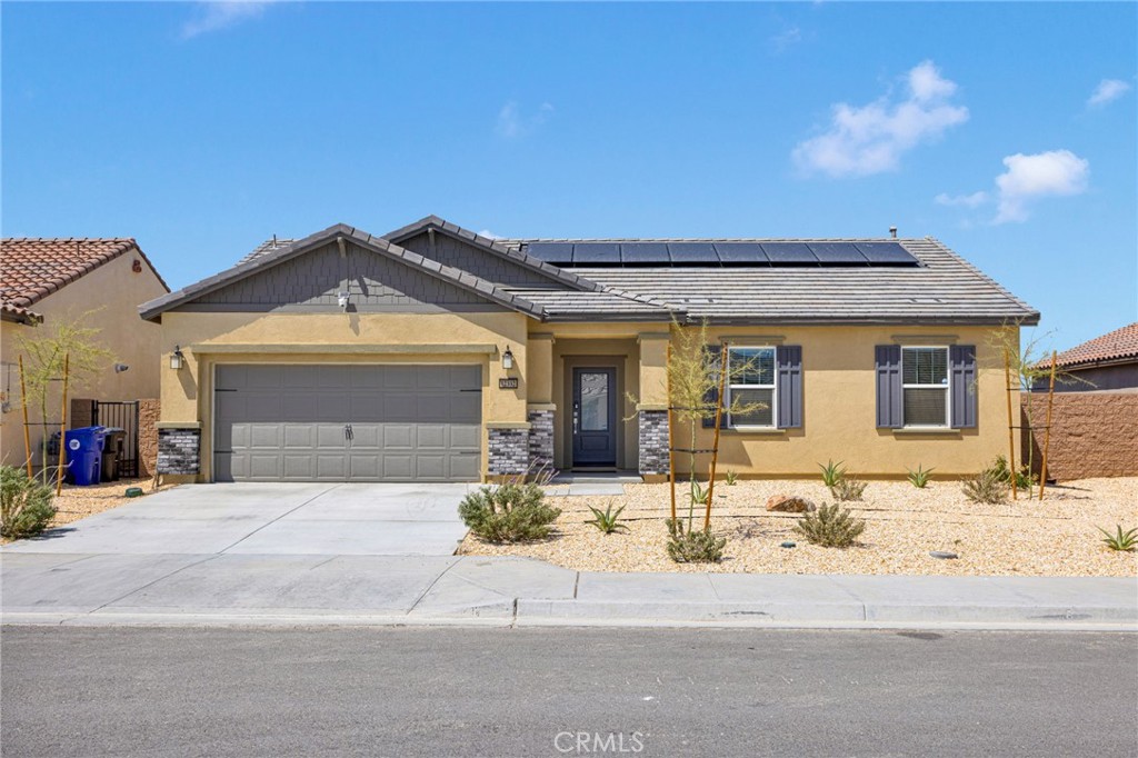 Beautiful 2023 new construction in Desert Willow Village featuring 3 bedrooms, 2 baths, granite countertops, vinyl plank flooring, Wi-Fi-enabled garage door opener, and owned solar panels. Located just 3.5 miles from High Desert Gateway and 4 miles from Adelanto Marketplace, with easy access to Highway 395 for commuters working down the hill, energy efficiency, and a prime location close to shopping, dining, and entertainment.