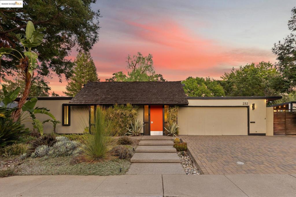 Discover this rare Claude Oakland-designed gallery model super Eichler in Walnut Creek’s desirable Northgate neighborhood. Built in 1969, this mid-century modern 4BD/2BA home offers 2,308 SF (per tax records) of thoughtfully upgraded living space. The iconic atrium entry sets the tone for the open floor plan, featuring radiant-heated polished concrete floors, floor-to-ceiling windows, & a reimagined kitchen with Thermador appliances, Sub-Zero refrigerator & spacious island. Remodeled bathrooms include stylish designer finishes, enhancing the home’s modern appeal. Seamless indoor-outdoor flow leads to a private resort-style backyard complete with a sparkling pool, relaxing spa, fire pit, pergola, cactus garden & multiple decks, ideal for entertaining or a peaceful retreat. A detached custom-built office/studio with mini-split system adds flexibility for today’s work-from-home lifestyle. Located near top-rated schools, local parks, shopping & major commute routes to SF and Oakland, this home blends iconic architecture with everyday convenience.