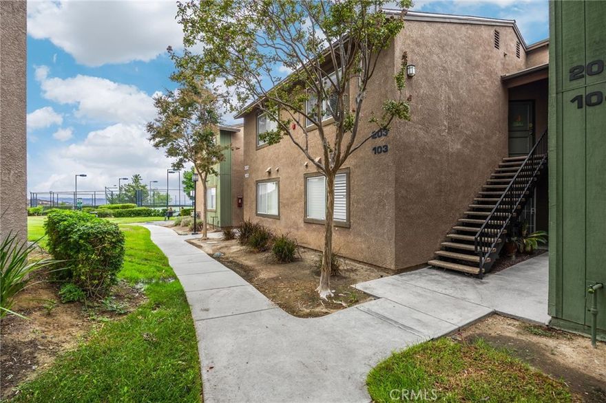 Uncover your dream home in this beautifully remodeled, turnkey top-floor condo in the gated Crowne Villas community, perfectly nestled above the serene, picturesque hills of Corona near Green River (Ontario and Avenida del Vista). This bright, open-concept one-bedroom, one-bath upstairs unit exudes warmth and charm, featuring a cozy, remodeled fireplace, newer carpet, paint, blinds, and a stylishly updated bathroom with new fixtures and tile. The open kitchen flows into a breakfast/dining area and connects to a private patio, ideal for relaxing and enjoying breathtaking panoramic views of the lush, mountainous 12-acre community. Equipped with modern conveniences, the unit includes a dishwasher, stove, microwave, fridge, and stackable washer/dryer. Ample storage enhances everyday living, while the serene, quiet setting is perfect for professionals seeking peace after a busy day. Community amenities elevate your lifestyle with a clubhouse, sparkling pool, spa, gym, tennis and volleyball courts, a dog park, scenic walking paths, and inviting benches to soak in the stunning hillside views. This upstairs unit in a two-story building offers a carport parking spot and ample open parking for guests. Located close to shopping centers, schools, and parks, this condo offers resort-style living in a tranquil, gated community.