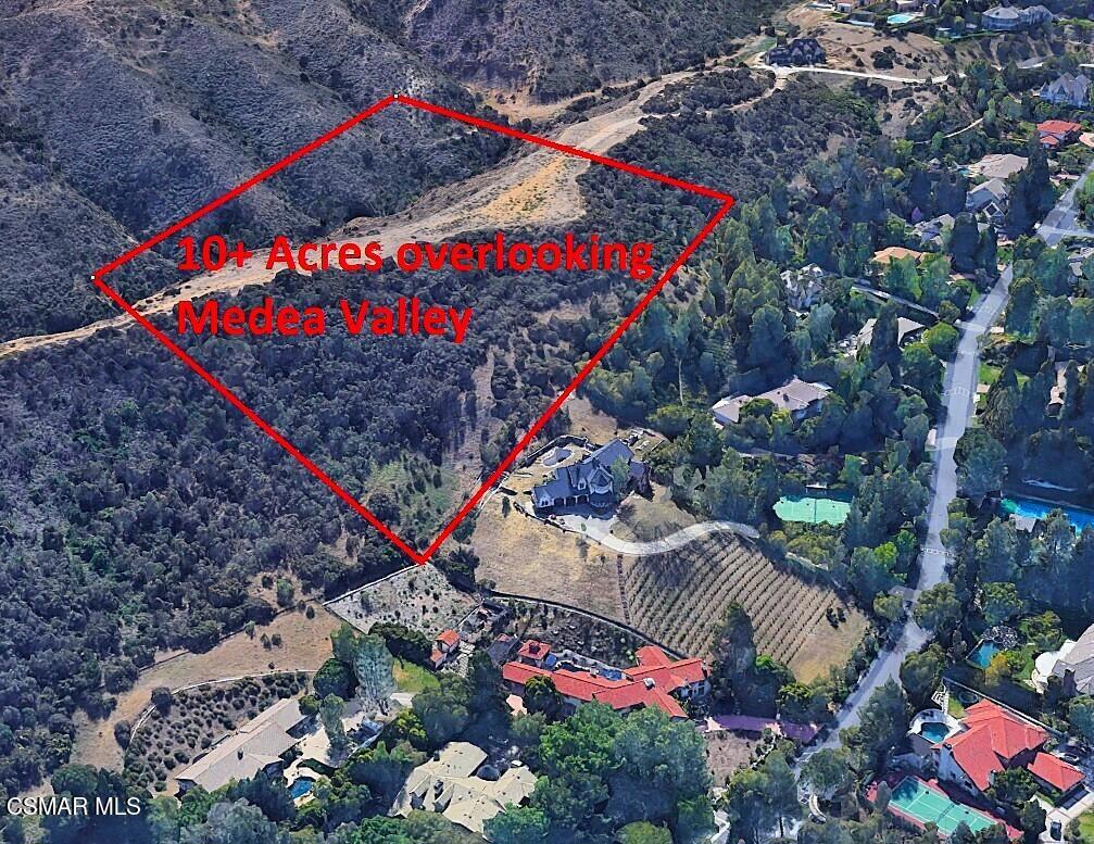 Rare 10-Acre Hilltop Lot with Sweeping Views in Coveted Agoura Hills. Very minimum grading! An exceptional opportunity awaits atop Medea Valley in Agoura Hills--10 acres of prime land offering a unique blend of development potential and luxury living. With approximately 1.4 acres of flat, buildable space, this elevated parcel boasts unobstructed panoramic views of rolling hills and neighboring multi-million dollar estates. Whether you're a developer seeking your next high-end project or a discerning buyer looking to build a custom dream home, this lot offers unmatched value and versatility. The natural elevation provides privacy, tranquility, and breathtaking sunsets, while the expansive acreage allows for creative architectural possibilities, resort-style amenities, and generous open space. Situated in a prestigious enclave of Agoura Hills, just minutes from award-winning schools, upscale shopping, dining, and a short drive to Malibu beaches and the 101 freeway--this location blends rural serenity with urban convenience. Don't miss this rare chance to own a piece of Agoura's most desirable landscape--ideal for crafting a signature estate or premium investment property. *Unincorporated LA County - Not in coastal!