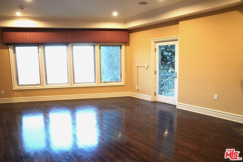 Photo of 4212 Don Alanis Place, Los Angeles, CA 90008 (MLS # 25620629)