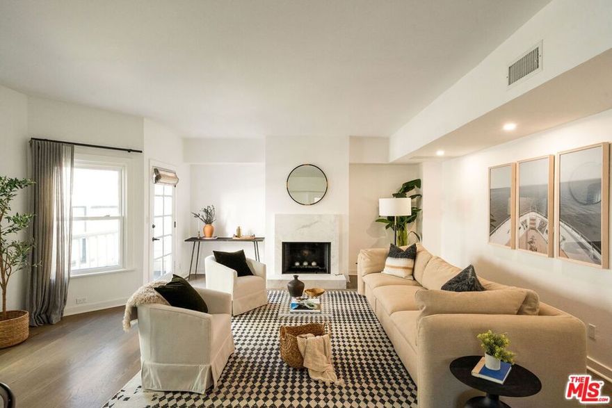 Coastal charm meets modern comfort in Ocean Park. This beautifully updated Victorian-style townhouse is just blocks from the Pacific and offers 3 bedrooms, 3 baths across three spacious levels with exceptional indoor/outdoor living. The sun-filled rooftop deck captures serene west-facing views and ocean breezes.On the lower level, two bright bedrooms with bay windows and walk-in closets sit alongside a guest bath and enclosed laundryperfect for privacy and comfort. The primary suite opens to a secluded, dog-friendly patio and features a stunning renovated ensuite with heated floors, fireplace, motion-sensor lighting, LED mirror, and high-end fixtures.The main level is designed for easy living and entertaining, centered around a chef's kitchen with a generous island flowing into open living and dining areas, plus a cozy fireplace and private patio. Upstairs, a versatile third bedroom with fireplace, full bath, and French doors opens to a west-facing deckideal as a home office, gym, or sunset lounge. Smart-home upgrades include Alexa-controlled primary fireplace, remote locks, Ring security, and digital thermostat. Additional highlights: two side-by-side subterranean parking spaces, security gates, extra storage, and an encased outdoor TV setup for year-round enjoyment. Set within an intimate three-unit community that lives like a private home, this rare coastal rental is moments from Abbot Kinney, Rose Ave, top cafe's, parks, and beaches offering the best of Santa Monica living.