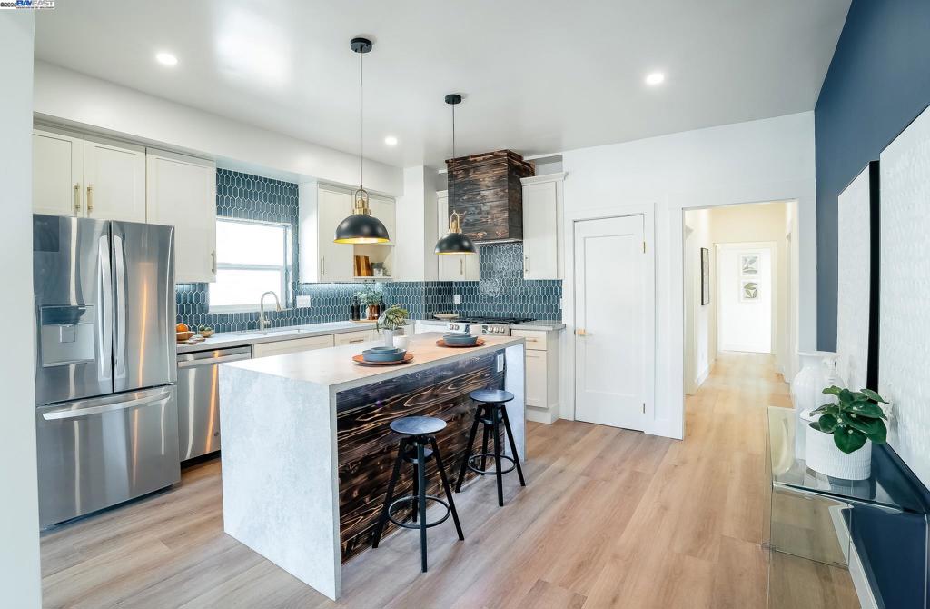 Beautifully remodeled in the heart of Oakland! This turnkey 3-bedroom, 2-bathroom home features an open layout, updated kitchen with countertops, stylish backsplash, new cabinetry, and stainless steel appliances. Modern upgrades throughout include new flooring, recessed lighting, and fresh exterior/interior paint. A bonus room and pDetached rear structure offers potential for an ADU (buyer to verify). Located in a desirable Oakland neighborhood.