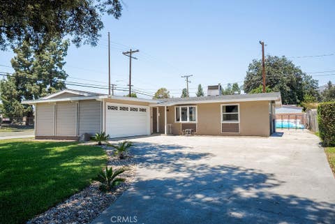 Photo of 703 E Hollyvale Street, Azusa, CA 91702 (MLS # CV26145480)