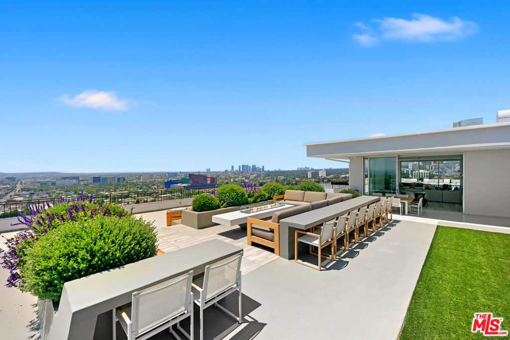 Rare Find Penthouse at Empire West. Live above it all in this rare, nearly 4,000 sq. ft. Penthouse in the iconic Empire West, one of Los Angeles' most prestigious and sought-after high-rise buildings. This expansive 3-bedroom, 3.5-bath residence features a formal entry, an old Hollywood Style bar and lounge area, a family room, formal dining room, and an open-concept living space designed for both grand entertaining and comfortable everyday living. Floor-to-ceiling walls of glass showcase breathtaking 180-degree jetliner views from Beverly Hills to Downtown LA, flooding the space with natural light and highlighting timeless and elegant finishes throughout. Empire West offers world-class amenities including a rooftop pool and private clubhouse with and outdoor fire-pit perfect for enjoying sunsets, a full-service fitness center, tennis court, 24/7 valet parking, concierge service, and top-tier security. Located just moments from Sunset Plaza, this is high-rise luxury redefined in the heart of West Hollywood.