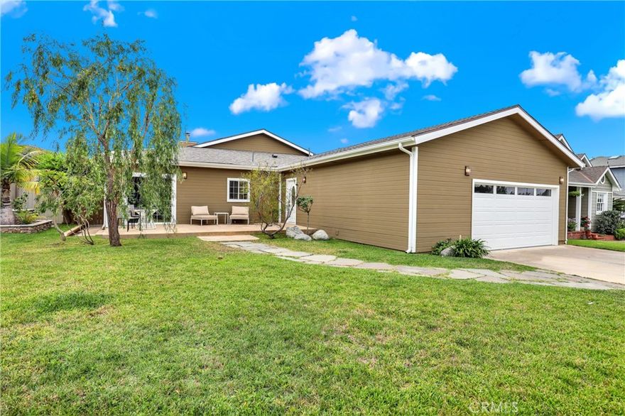 Spectacular single-level updated home of over 3,000 square feet nestled on a cul-de-sac in the highly desirable area of Eastside Costa Mesa. Located near Newport Back Bay, this jewel with a lot size of nearly 8,300 square feet exudes the beach vibe with sophisticated coastal charm. As you enter the foyer, meander into the enormous living room with vaulted high ceilings, skylights for optimum light, inviting fireplace, adjacent dining space, and an attractive open floor plan which leads you into the stunning remodeled Island Kitchen with new custom Asheville Cotton white oak cabinets, new stainless steel appliances, new luxury plank flooring, new recessed lighting, dazzling large island bar with Whiskey Royale white oak cabinets, built-in wine cooler, food pantry, new premium sink and faucet, and gorgeous brass cabinet and door handles with brown leather inlays. This impressive home has new luxury plank flooring and baseboards throughout, new interior paint throughout, new exterior paint throughout, new lighting throughout, and much more. Adjacent to the living room, is a room with many options including a family room, den, or office with direct access to the backyard. As you transition to the 3 bedrooms, you will exit stage left to the spacious primary suite with large walk-in closet, high ceilings, luxurious bathroom with new travertine tile, new quartz countertops, new faucets and lighting, new seamless glass shower, and a relaxing soaking tub. As you stroll over to middle bedroom you will be greeted with a staircase up to a loft ideal for a children's play area with this room having plenty of storage for all your goodies. Adjacent to the middle bedroom you will find a delightful bathroom with high ceilings, skylight, and new light fixture & faucet. The third bedroom is a suite featuring a walk-in closet, remodeled bathroom with new travertine flooring, quartz countertops, seamless glass shower with fancy ceramic tile and vanity. Make your way out to the newly landscaped backyard ideal for entertaining family and friends with a spacious patio area, custom fire pit table, deluxe barbecue with additional gas stove top and refrigerator, avocado and peach tree, and new hedge trees for privacy. Take advantage of this opportunity to own your slice of coastal heaven close to Newport Beach, Newport Harbor, Hoag Hospital, Fashion Island, John Wayne Airport, Fine Dining, Luxury Shopping, and much more. It's time to make this your dream home!