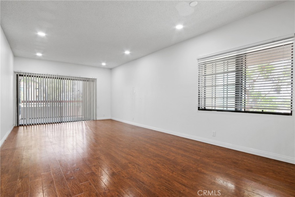 Move-in ready, beautifully updated 2 bedroom and 2 bathroom corner unit in a desirable Torrance location! Enjoy a bright and open floor plan with a spacious living and dining area, bar counter, and wet bar with sink—perfect for entertaining! The primary suite offers a generous closet and updated ensuite bathroom. You can relax on the spacious balcony with serene views of trees, greenery, and the sparkling pool. Additional highlights include updated bathrooms, spacious bedrooms, two side-by-side parking spaces, and guest parking. This spacious condo features only one shared wall and is close proximity to the elevator that takes you to garage level, near assigned parking spaces. Community amenities include a pool and a hot tub. Centrally located near public transit, the 110 & 405 freeways, top shopping, dining, and just minutes to the beach!