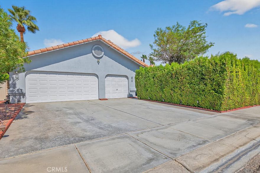 Fully furnished and beautifully remodeled, this 3-bedroom, 2-bath single-story pool home in Cathedral City offers the perfect blend of comfort and resort-style living. Step inside to a spacious high-ceiling living room furnished with couches, a coffee table, bean bag loveseat, dining set, and treadmill. The family room, complete with additional couches and a coffee table, flows seamlessly into the chef’s kitchen, which is truly the heart of the home. The kitchen boasts glossy lacquer cabinetry, an oversized island with seating, a built-in range, double oven, microwave, dishwasher, refrigerator, and is fully stocked with every dish and utensil you could need—ideal for both everyday living and hosting gatherings.



The primary suite is a relaxing retreat with dual closets, direct access to the backyard, and a spa-inspired bathroom featuring double sinks, a soaking tub, tiled walk-in shower, and private water closet. Two additional bedrooms are comfortably furnished with beds, nightstands, and ceiling fans, and share a remodeled walk-in shower bathroom. Flooring includes tile throughout the living areas and laminate wood in the bedrooms, along with a separate laundry room offering cabinetry and a sink for added convenience.



The backyard is designed for entertaining and relaxation, featuring a sparkling pool and spa, outdoor dining area with BBQ and flat grill, cozy seating around the fire pit, two egg chairs, four lounge chairs, a hammock, and an expansive dog run. The front yard is lined with mature trees providing privacy and tranquility. A two-car garage is available for tenant use, with the third bay reserved for owner storage.



Located on a quiet street just minutes from I-10 and only 15 minutes from Downtown Palm Springs, this home is close to Agua Caliente Casino, Desert Hills Premium Outlets, golf courses, and world-class dining and shopping. With its furnished interiors, upgraded finishes, and entertainer’s backyard, this home is ready to be enjoyed from day one.
