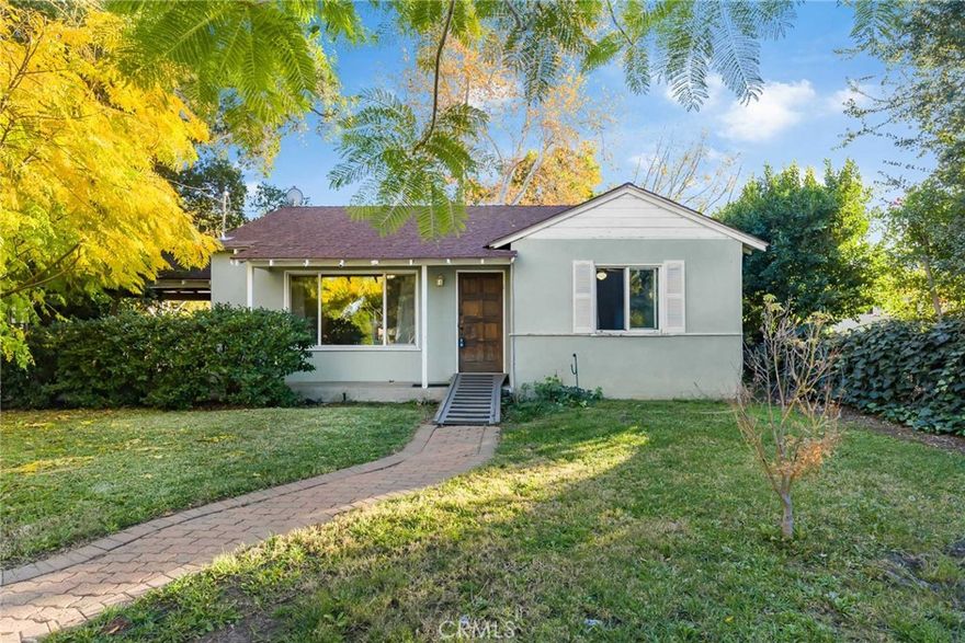 Located in the heart of Encino, 17806 Erwin Street offers a rare multi-unit opportunity set within a very peaceful and serene setting, combining exceptional land, income potential, and future development possibilities. This unique property features two separate living units—a main house and a detached casita—situated on an expansive parcel that extends all the way from Erwin Street to Delano Street, creating an unusually deep and highly functional lot rarely found in this neighborhood. The main residence welcomes you with natural light, original charm, and a comfortable layout, including a spacious kitchen and peaceful bedrooms surrounded by greenery. The detached casita offers outstanding flexibility for rental income, extended family, guests, or use as a private studio or office, with excellent separation between both units to enhance privacy and versatility. Beyond the existing structures, the back portion of the lot is a true standout, offering ample space and access for the potential construction of a third residence, additional units, or long-term development strategies. Mature trees, open space, and the natural layout of the property create a quiet, tranquil atmosphere rarely found in such a central location. This property has been lovingly held within the same family for nearly 50 years, carrying strong emotional value and a sense of history that is felt throughout the grounds. Whether you are an investor, developer, multi-generational buyer, or owner seeking income support and long-term upside, this property presents an opportunity that seldom becomes available in Encino. Two existing units, a lot deep enough to accommodate a third home, and a setting that offers both privacy and calm make this an exceptional offering for immediate value and future growth.