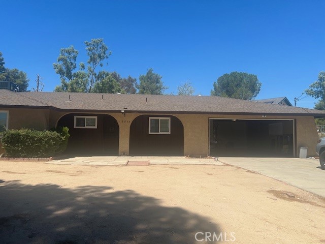 Move in ready. Rural country living in this ranch style home, located in the the Mesa area of Hesperia. Very good schools and very quiet area.There is so much to mention. Laminate flooring throughout, Freshly painted interior, new dual pane windows and mini-blinds. New HVAC unit. Kitchen features wood cabinets and granite counter tops and pantry plus utility closet. Spacious living room with stone fireplace, a raised hearth and mantel.. Dining area in kitchen plus formal dining area. Laundry features gas and 220 hookups. New raised panel doors and new knobs plus all new electrical outlets with GFI in kitchen and bathrooms. Ceiling fans in bedrooms and dining room. The exterior is all fenced with 2 sheds for storage, the larger one measures 10x16. Oversized garage with area for work bench, new garage door and garage door opener. An enclosed patio can be used as craft room. Buyers will love this home.