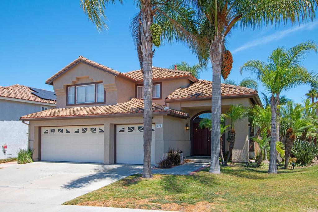 This Rancho Del Oro home sits on over 5,000 square feet of land and is just 10 minutes from the beach! Hop on Highway 76 for a straight drive to the ocean. This two-story home offers a warm and welcoming entrance with a sunken living room that flows seamlessly into the dining area. On the first level, you’ll find a bedroom and full bathroom—perfect for guests or multigenerational living. Step into the lush backyard filled with fruit trees and vibrant greenery, creating a peaceful outdoor retreat. Upstairs, the spacious master bedroom with its private ensuite bath invites you to relax and unwind.
