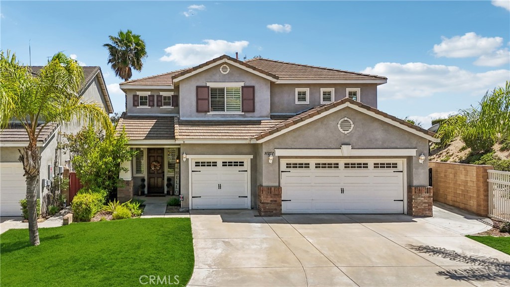 Welcome to this beautifully upgraded Rancho Bella Vista home, perfectly situated at the end of a quiet cul-de-sac with no neighbors on the side—offering ultimate privacy and tranquility. An open, flowing floor plan and engineered bamboo floors throughout the main living areas create a warm and inviting atmosphere. The spacious kitchen has been tastefully updated with crisp, white cabinetry, granite countertops, stainless steel appliances, a large center island, and ample storage—ideal for both everyday living and entertaining. A full bathroom on the main level adds ease and convenience to everyday life. Upstairs, you'll find all four bedrooms, two full baths, a built-in study nook with a desk, and a convenient upstairs laundry room—no need to carry loads up and down stairs. The light-filled primary suite includes white cabinetry, dual sinks, a separate vanity, and a luxurious soaking tub where you can unwind while enjoying scenic views. Meander outside to your own private backyard oasis featuring a large Alumawood-covered patio with ceiling fans, lighting, and a TV. Enjoy relaxing evenings around the outdoor fire pit or add your own hot tub, as it’s plumbed and ready to go! A grassy area provides space for kids or pets to play, and the patio is ready for your future built-in BBQ. A darling two-story playhouse with slide is ready to spark imaginative play for young and old alike! The lot is large enough to add a pool, if so desired too! The oversized driveway offers ample parking space and is large enough to accommodate additional guests. Energy-efficient solar panels complete this truly turn-key home. Award-winning TVUSD schools are just blocks away, no need to sit in carpool lines, quality time with the kids awaits as you enjoy the easy stroll. Come and enjoy all this beauty has to offer!