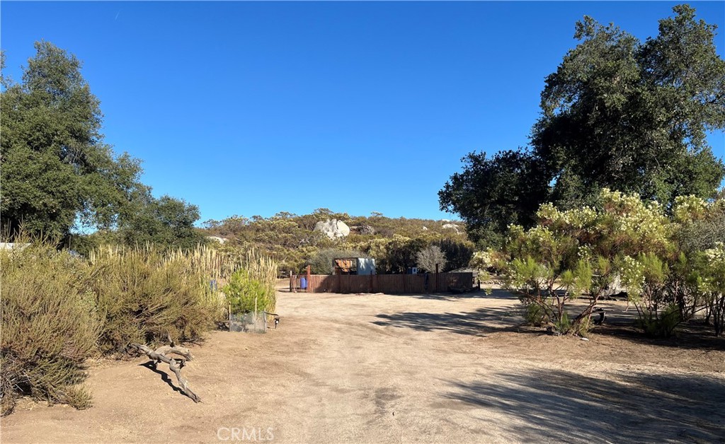 20 acre parcel in Benton Oaks area of Sage. Gently rolling parcel with with oak trees, usability, and incredible views. This parcel is partially cleared and has a producing well. This parcel is partially fenced with an electric gate. It is approximately 1 mile off pavement (Red Mtn. Rd.). Excellent parcel for horse ranch, agriculture or simply serene country home. Suitable for custom home or modular home. 15 minutes from downtown Hemet. 15 minutes from Temecula wine country. 30 minutes to Casino or Old Town Temecula. It is an ideal setting for that weekend ranch to get away from the pressures of urban living & enjoy the peace and serenity country living yet still within easy access to all of the amenities of suburban living.