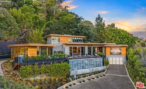 Photo of 727 N Beverly Glen Boulevard, Los Angeles, CA 90077 (MLS # 25611617) Photo of 727 N Beverly Glen Boulevard, Los Angeles, CA 90077 (MLS # 25611617)