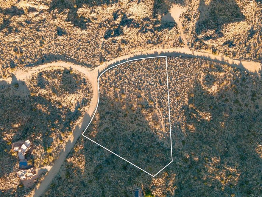 Easy to build on 2.61 acre lot located in the gated community of Royal Carrizo overlooking the Coachella Valley! Royal Carrizo is a small enclave of multimillion dollar view homes located just off Highway 74 above Palm Desert. This lot requires no major grading or rock removal needed in order to put in your house pad, driveway or septic field! Extraordinary daytime and nighttime views of the desert below. All 4 corners are marked and the lot has a gentle slope. Royal Carrizo community has its own water system and utilities are underground. Enjoy the hiking trails and privacy!