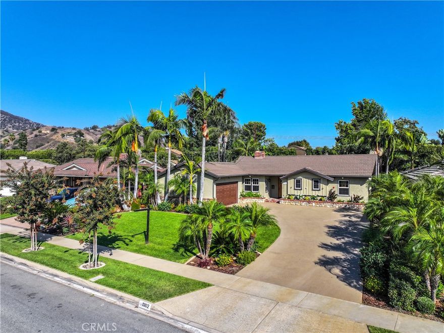 Absolutely Stunning Entertainer’s Dream with Glendora Schools! Tucked away on a tree-lined street near the Glendora Country Club, this single story pool home is a hidden gem with incredible curb appeal and breathtaking mountain views.

Just in time for summer, enjoy your own backyard paradise complete with a sparkling Pebble Tec pool and spa, tropical landscaping, fruit trees including orange, lemon, and avocado, and multiple entertaining spaces.

Inside, the home offers 3 bedrooms, 2 bathrooms, and a spacious living room with engineered wood floors, a real stacked stone fireplace with ceramic log set, and seamless access to the backyard retreat. The remodeled kitchen boasts stainless steel appliances including a 6 burner Thor range, KitchenAid dishwasher, and refrigerator, along with tile flooring, stacked stone fireplace, and an oversized dining area perfect for gatherings.

The seller has spared no expense on upgrades which include remodeled kitchen and baths, recessed lighting, plantation shutters, solid wood interior and entry doors, barn door, copper plumbing, updated electrical panel, new main and grey water lines, solar system, Milgard dual pane windows, custom sliding door, new garage door and opener, landscaping, exterior lighting, and more.

Additional highlights include a 2 car attached garage, ample driveway parking, slurred driveway and decking, plus award winning Glendora Schools. Conveniently located near schools, shopping, and freeways.

This turnkey home truly has it all. Do not miss it!