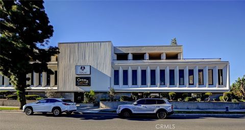 Photo of 10841 Paramount Blvd #204, Downey, CA 90241 (MLS # DW26074213)