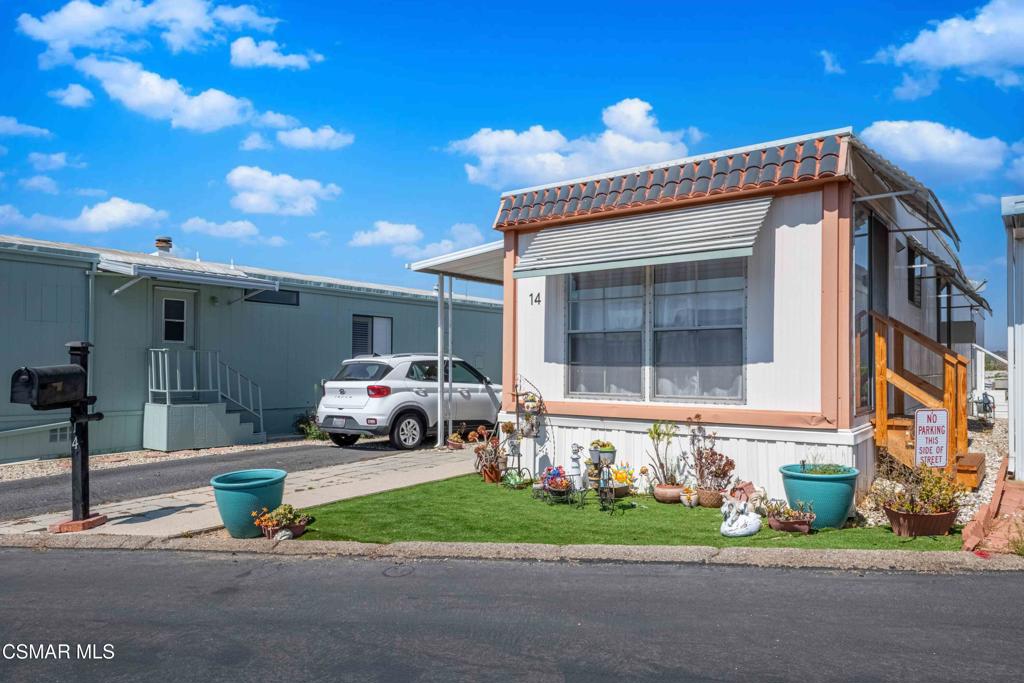 Welcome to Ventu Villas 55+ Senior Mobile Home Park in scenic Newbury Park. This home is move-in-ready, offering newer flooring, tankless water heater, wall A/C, furnace, shower and quartz vanity countertop. Enjoy your morning coffee in the light and bright kitchen nook with lovely morning and sunset views of the local mountains. The enclosed porch offers beautiful breezes, extra space for hobbies, storage or relaxing with a good book. Enjoy the parks' pools, spa, clubhouse, and monthly activities. Conveniently located to grocery stores, malls, restaurants, hiking and biking trails.