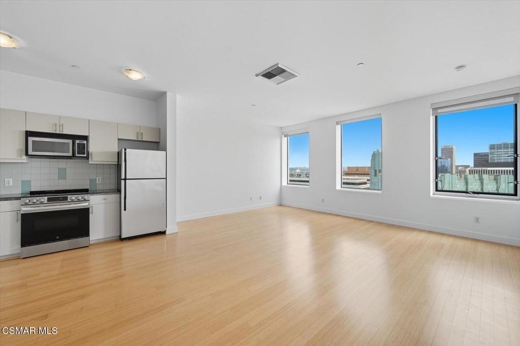 Welcome to this stunning, luxury high rise condominium in the heart of Koreatown. 3810 Wilshire BIvd #1506 is a spacious, open-concept 1 bed/ 1 bath with beautiful eastern DTLA views, perfect for watching the sunrise.Overlooking the historic landmark Wiltern Theater, featuring it's stunning art deco design, you can rest easy knowing your view will never be obstructed. With newer appliances, granite countertops, a large walk-in closet, in-unit laundry, and a large bathroom, this unit has it all. Life at The Mercury is the epitome of comfort and safety, with 24/7 security, package management, gated on-site parking, and a 23rd story rooftop featuring top of the line amenities. Amenities include full gym, pool & spa, barbecue pit, grassyarea, and 360 views spanning the Greater Los Angeles area. Local features include metro access, centrally located to multiple shopping, services, dining, and nightlife options, ample guest parking, and more!