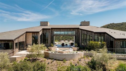 Photo of 3121 Old Topanga Canyon Rd, Calabasas, CA 90290 (MLS # GD26025272)