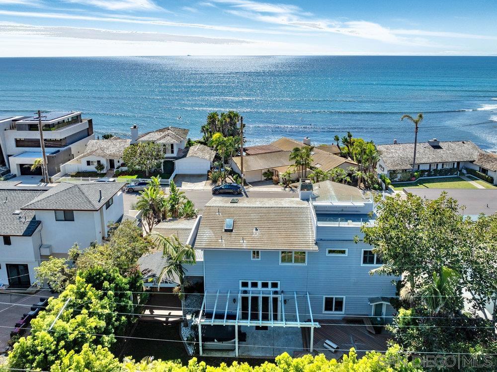 Experience stunning Pacific Ocean views from this Rare Traditional-Modern home steps from the beach. Positioned on a cul-de-sac across from the ocean this home effortlessly blends contemporary elegance with coastal charm, offering space, privacy, location gourmet kitchen with a large island and modern stainless steel appliances, perfect for cooking enthusiasts. Enjoy 2 ensuites, one up & one down, family room, BBQ deck, sauna, and spa in very private back yard. The rooftop deck provides panoramic views for relaxation and entertainment. This home seamlessly combines timeless elegance with modern comfort. Schedule a viewing today and discover the epitome of coastal living ! UNFURNISHED