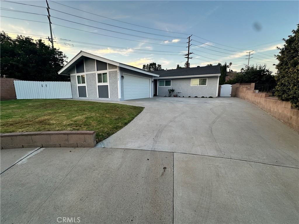 Endless possibilities await! This 4-bedroom, 2-bath residence offers 1,376 sq ft of living space and sits on nearly a 10,000 sq ft lot. Whether you envision adding personal upgrades or enjoying it as is, the home’s layout and location make it a versatile choice. Close to parks, shopping, and schools, it’s a rare find in one of Saugus’ most desirable areas. The spacious backyard is perfect for entertaining, gardening, or creating your own outdoor oasis, while the generous driveway, RV access, and attached garage provide ample parking and storage. Don’t miss your chance to make this inviting property your own!