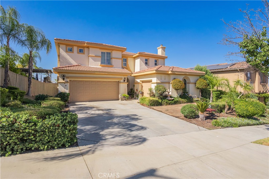 One of the Most Breathtaking Canyon Lake View Homes in the Tuscany Hills Community of Lake Elsinore!
Welcome to 51 Via De La Valle, a beautifully crafted Mediterranean-style residence offering stunning, unobstructed views of Canyon Lake. Built in 2005, this expansive two-story home features 4 bedrooms, 2.5 bathrooms, and 3,493 sq ft of thoughtfully designed living space. From the moment you arrive, you’ll be captivated by the home’s architectural charm—including an arched entryway and a beautifully landscaped front yard. Inside, the layout is perfect for both everyday living and entertaining. The main level offers a formal living room with a cozy fireplace, a formal dining room, and a modern kitchen equipped with granite countertops, an oversized custom island, abundant cabinetry, and a Butler’s pantry. The kitchen opens seamlessly to a spacious family room, creating a comfortable and inviting gathering space. Upstairs, all four bedrooms are generously sized, providing comfort and flexibility for any lifestyle. The versatile upstairs retreat, currently used as a family entertainment room with a second fireplace, could easily be converted into a fifth bedroom. The luxurious primary suite is a true haven, featuring a custom walk-in closet and panoramic lake views you can enjoy year-round—including snow-capped mountains in the winter. Step outside to your resort-style backyard on a 10,890 sq ft lot, where you'll find two patio areas, mature landscaping, a custom-designed waterfall, citrus trees, and swaying palms—perfect for relaxing, entertaining, or simply taking in the peaceful surroundings. Additional highlights include a 3-car garage/Casita, central A/C, and access to the exceptional Tuscany Hills amenities, including a clubhouse, pool and spa, fitness center, tennis, pickleball and basketball courts, BBQ area, and playground. With convenient access to the 15 freeway, this home is perfectly situated for both daily commuting and weekend getaways. Don’t miss this rare opportunity to own a luxurious view home with top-tier community features in one of Lake Elsinore’s most sought-after neighborhoods!