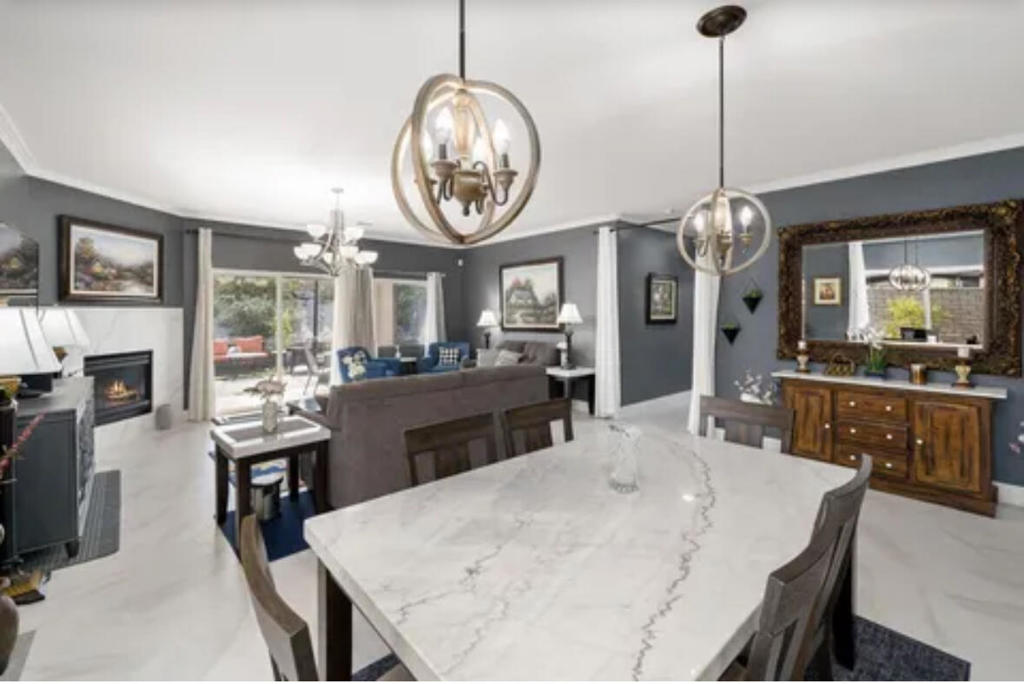 Completely upgraded home that is move in ready! Italian porcelain tile throughout most of the home. Crown moulding, and baseboards have been added along with new paint, rocker light switches, chandeliers and window treatments. Enter into a bright, open floor plan. The gourmet kitchen includes an island, LG fridge, Jenn Air convection oven, and an upgraded backsplash. Several sliding doors to the backyard. All 3 bedrooms have built in granite desks / office areas, upgraded porcelain floors and custom window treatments. Over $100,000 in upgrades in the backyard itself. Pavers, sun shades, fruit trees, designated sitting areas and 2 BBQ's. The garage includes a tankless water heater & security door. The low monthly HOA includes cable, internet and community gates. This home is close to the freeway, shopping, hospital, and more! You must see this home!
