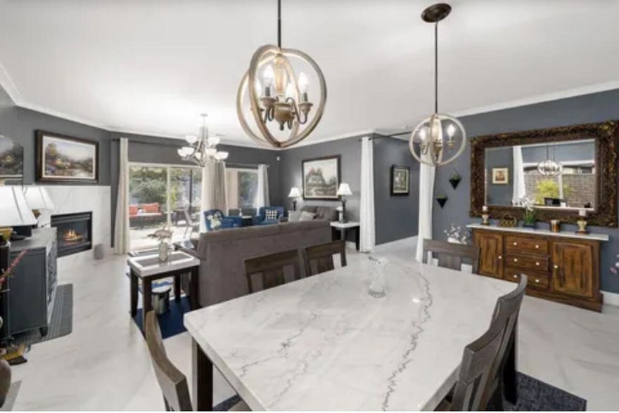 Completely upgraded home that is move in ready! Italian porcelain tile throughout most of the home. Crown moulding, and baseboards have been added along with new paint, rocker light switches, chandeliers and window treatments. Enter into a bright, open floor plan. The gourmet kitchen includes an island, LG fridge, Jenn Air convection oven, and an upgraded backsplash. Several sliding doors to the backyard. All 3 bedrooms have built in granite desks / office areas, upgraded porcelain floors and custom window treatments. Over $100,000 in upgrades in the backyard itself. Pavers, sun shades, fruit trees, designated sitting areas and 2 BBQ's. The garage includes a tankless water heater & security door. The low monthly HOA includes cable, internet and community gates. This home is close to the freeway, shopping, hospital, and more! You must see this home!