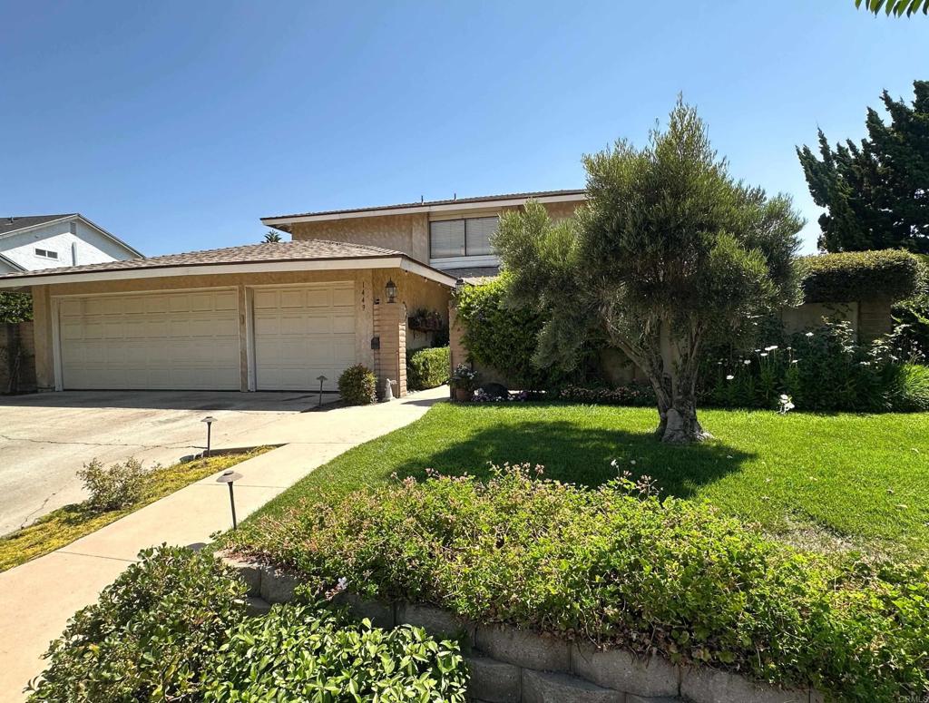 This lovely Fletcher Hills home is an entertainer's dream with incredible panoramic views of the El Cajon Valley and a welcoming entryway courtyard to greet you. This attractive home is on more than a quarter of an acre lot with 4 bedrooms and 2.5 bathrooms, 3-car garage with multiple built-in storage cabinets, and views from almost every room. The living room and fireplace offers a warm feel with when you enter the home and includes many built-ins. The layout of the home flows nicely into the spacious dining area with extra counterspace and storage. The kitchen is in the center of the home and opens up to the wet bar and family room providing ample space for all your living needs. Upstairs you will find an office with double doors, primary suite with a full bathroom and walk-in closet and two well-sized bedrooms with mirrored closet doors. The private backyard is an oasis boasting views galore, a water feature, lush gardens, built-in barbecue, a large deck, grass area, and fruit trees. Enjoy the nighttime city lights under one of the cabanas and watch the seasonal fireworks from your own backyard. Below the patio area are stairs that lead down the hillside with permitted Keystone reinforced earth walls and leads to more space to create your dream backyard. The home features an upgraded electrical unit and newer A/C. This home is conveniently located near major shopping and restaurants and close to the 125 and 8 freeways. Make this Fletcher Hills gem your very own!