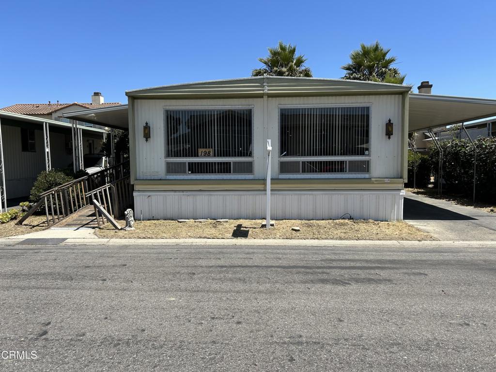 Are you looking for just the right project? Hoping to find a fixer you can remake to your own tastes? This 2 bedroom 2 bathroom spacious home in a quiet area of Buenaventura Mobile Home Estates senior park could be the one! You'll have a head start with newer central heating/air conditioning, newer water heater, newer 5 burner stovetop, R/O system, new skirting, and new tiles in the primary bathroom. Plus, a backyard with pavers and beautiful plantings such as Jasmine, Roses, Lavender, and Palm trees, will set you on the path to a lovely, relaxing retreat. This community offers a variety of social activities, perfect for the social butterflies who want to enjoy the company of friendly neighbors. The amenities at Buenaventura Mobile Home Estates include a huge pool, indoor spa, sauna, library, card room, and billiard room. This property has one of the lowest space rents in the county. Bring your tools and your imagination and make this one your own!