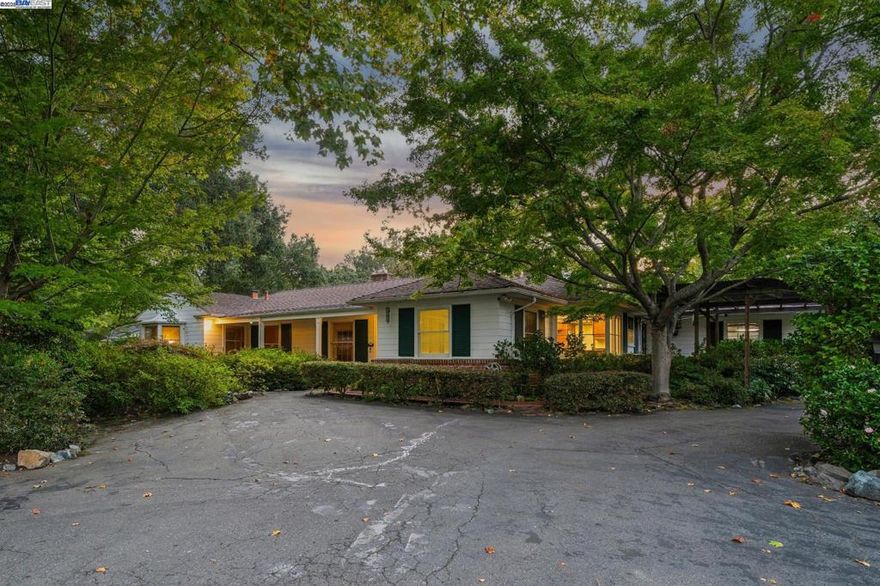 Value is in this spectacular land! Perfectly situated at the end of a quiet cul-de-sac, this flat 1.27-acre lot offers an incredible opportunity to create your dream home in Walnut Creek’s desirable Saranap neighborhood. The single-story rancher retains its original charm and sits surrounded by mature apple, fig, pomegranate, and persimmon trees. The expansive, level grounds provide endless possibilities—remodel the existing home, build a new custom estate with an ADU, design a multigenerational compound, or explore potential subdivision options (Buyers to Verify). A den can serve as a fourth bedroom, offering flexible living space. Enjoy the peaceful, nature-filled setting with a detached three-car garage, an abundance of detached storage sheds that can be used as workshops and historic water tower with well, pump, and pressure tank (unknown if operable). Ideally located just minutes from downtown Walnut Creek—home to world-class shopping, dining, and cafés—and close to top-rated Lafayette schools, Hwy 680, BART, and local airports. Whether you choose to restore its vintage charm or develop the property into something entirely new, this rare flat parcel offers exceptional potential in one of the East Bay’s most coveted neighborhoods.